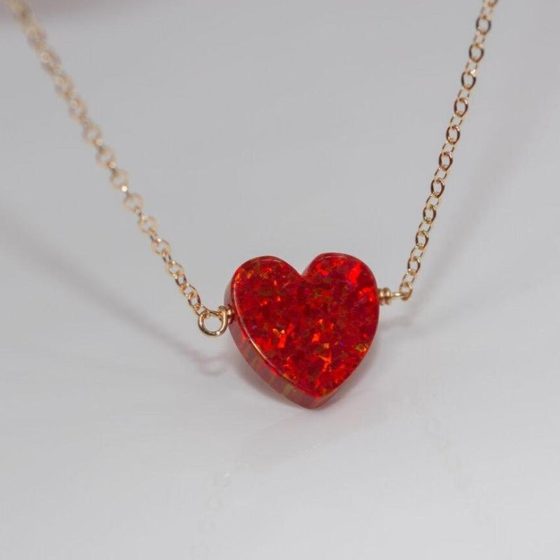Red heart opal necklace on thin gold chain