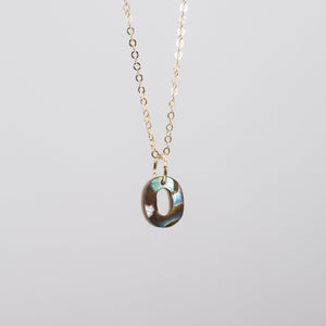 Personalized letter "O" necklace in abalone and gold