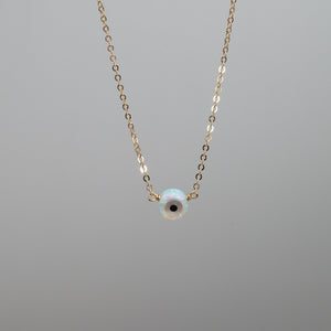 Small white opal evil eye necklace pendant