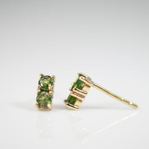 Side view of the double green chrome diospade pave gemstone earrings