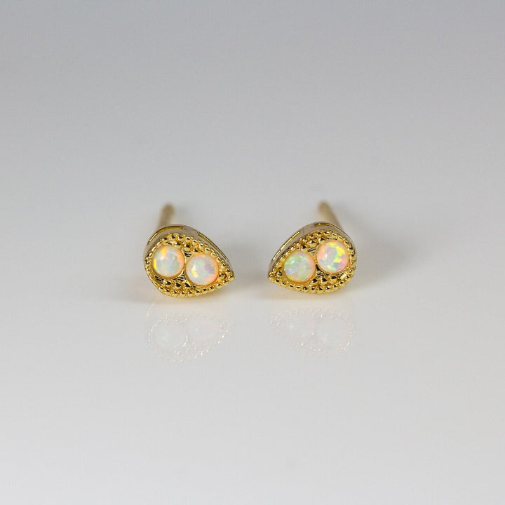 Teardrop gold earrings with double pearl pave gems