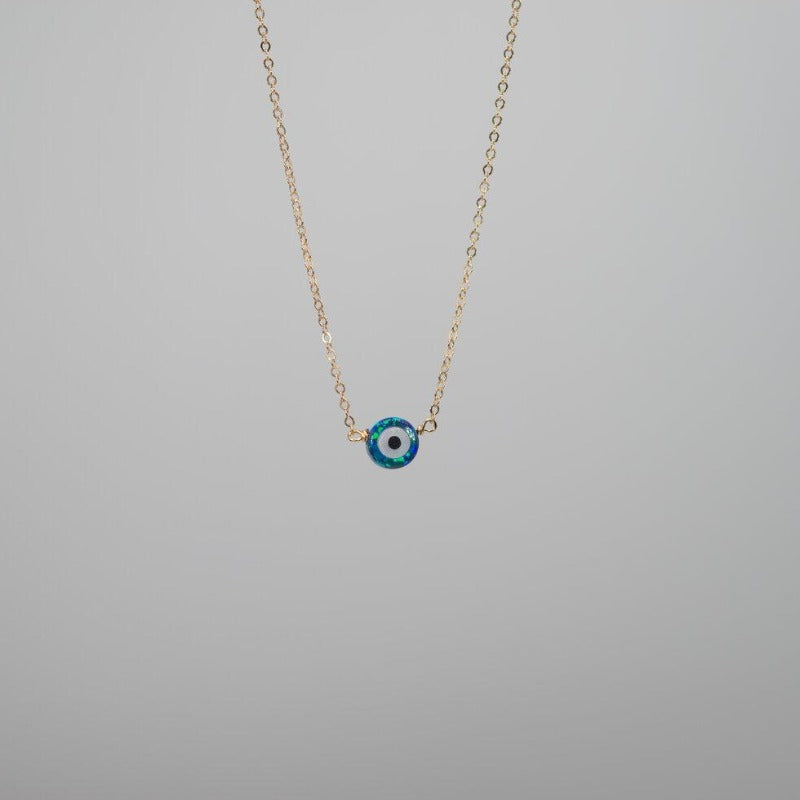 Small white opal evil eye necklace pendant