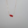 Dainty gold necklace with Red Nebraska state charm in opal