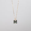 Letter "M" abalone shell necklace pendant on gold chain