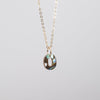 Personalized letter "O" necklace in abalone and gold