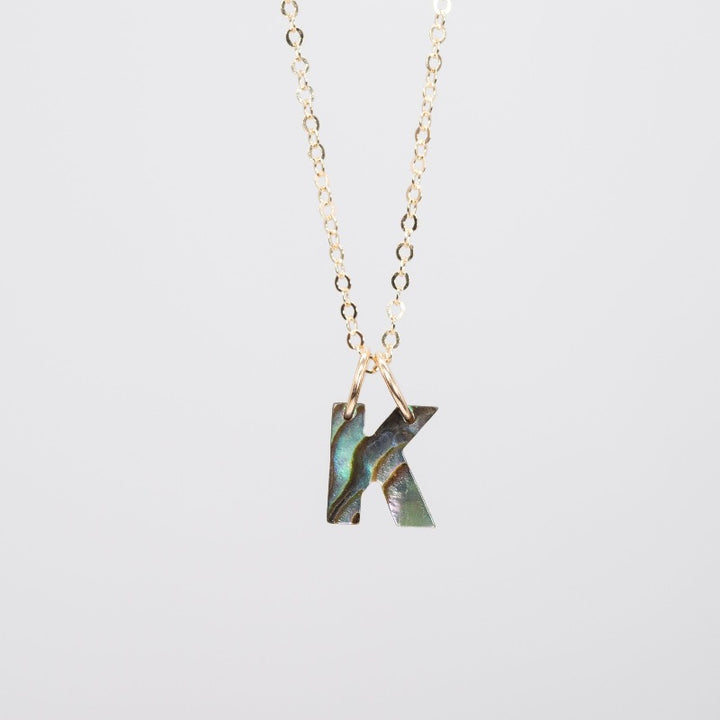 Capital "K" abalone pendant with delicate chain