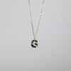 "G" abalone charm on delicate gold chain