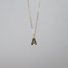 Abalone "A" charm on a gold chain