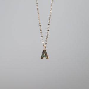 Abalone "A" charm on a gold chain