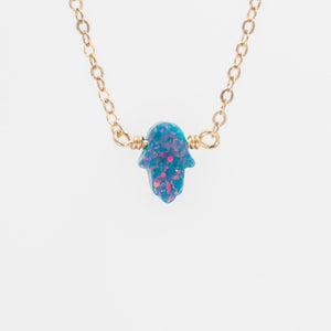 Turquoise blue and pink opal hamsa necklace on dainty gold chain