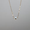 Small white opal evil eye necklace pendant