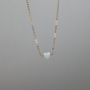 Tiny white heart necklace in opal and gold