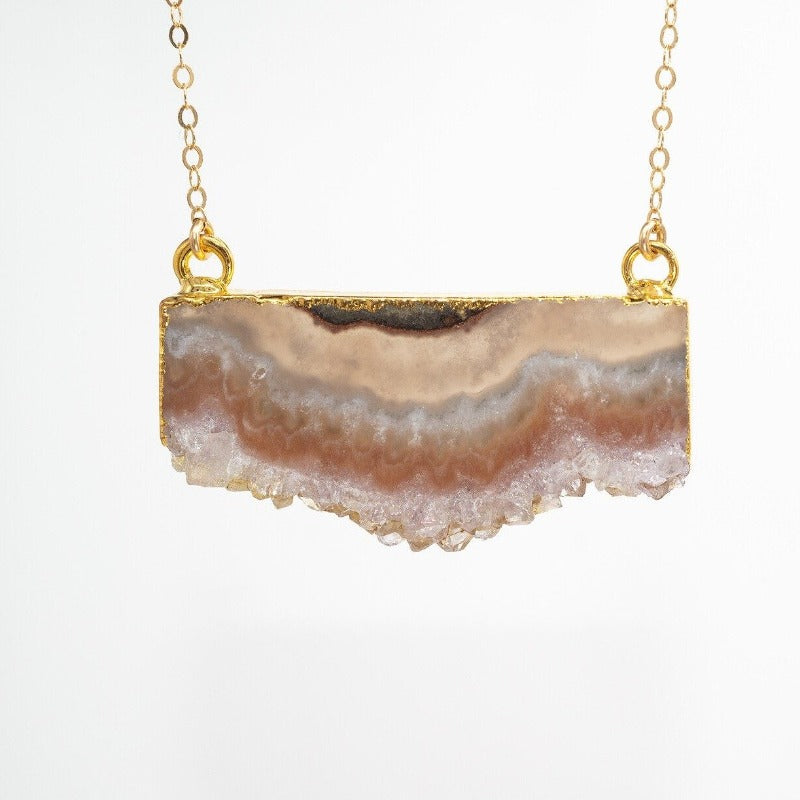 Raw edge amethyst slice pendant with gold chain