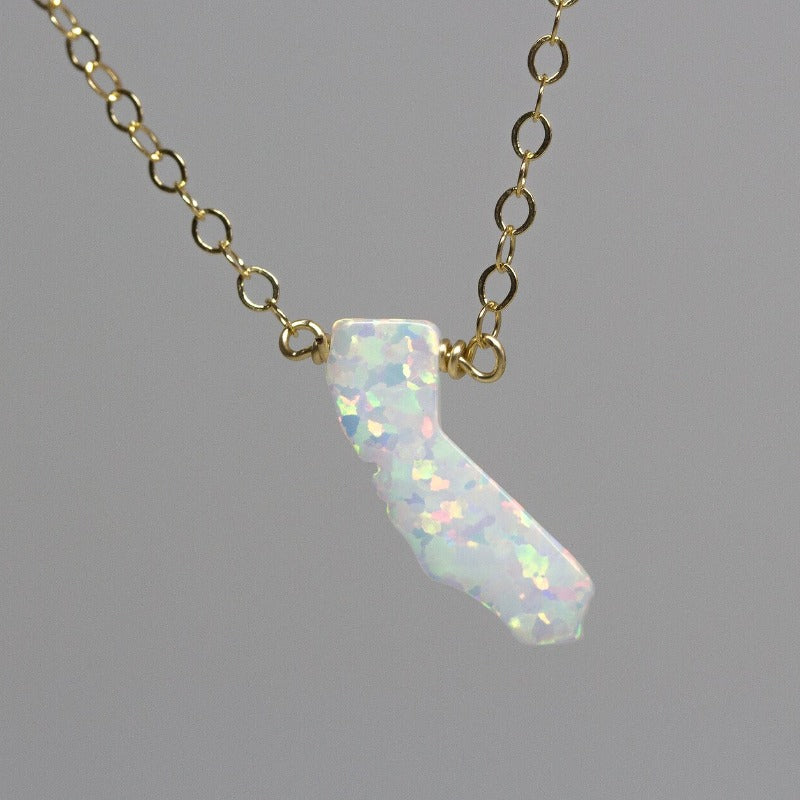 California shaped opal pendant on gold chain